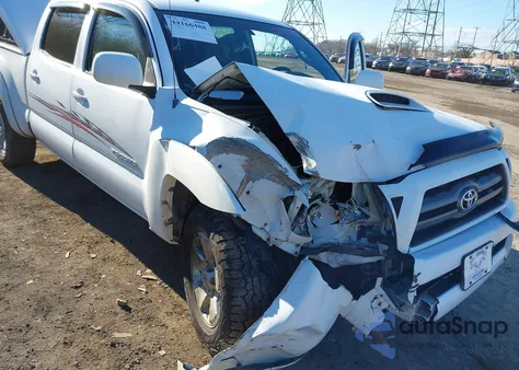 2009 Toyota Tacoma Base V6 z USA, uszkodzony, nr VIN 3TMMU52N89M010636